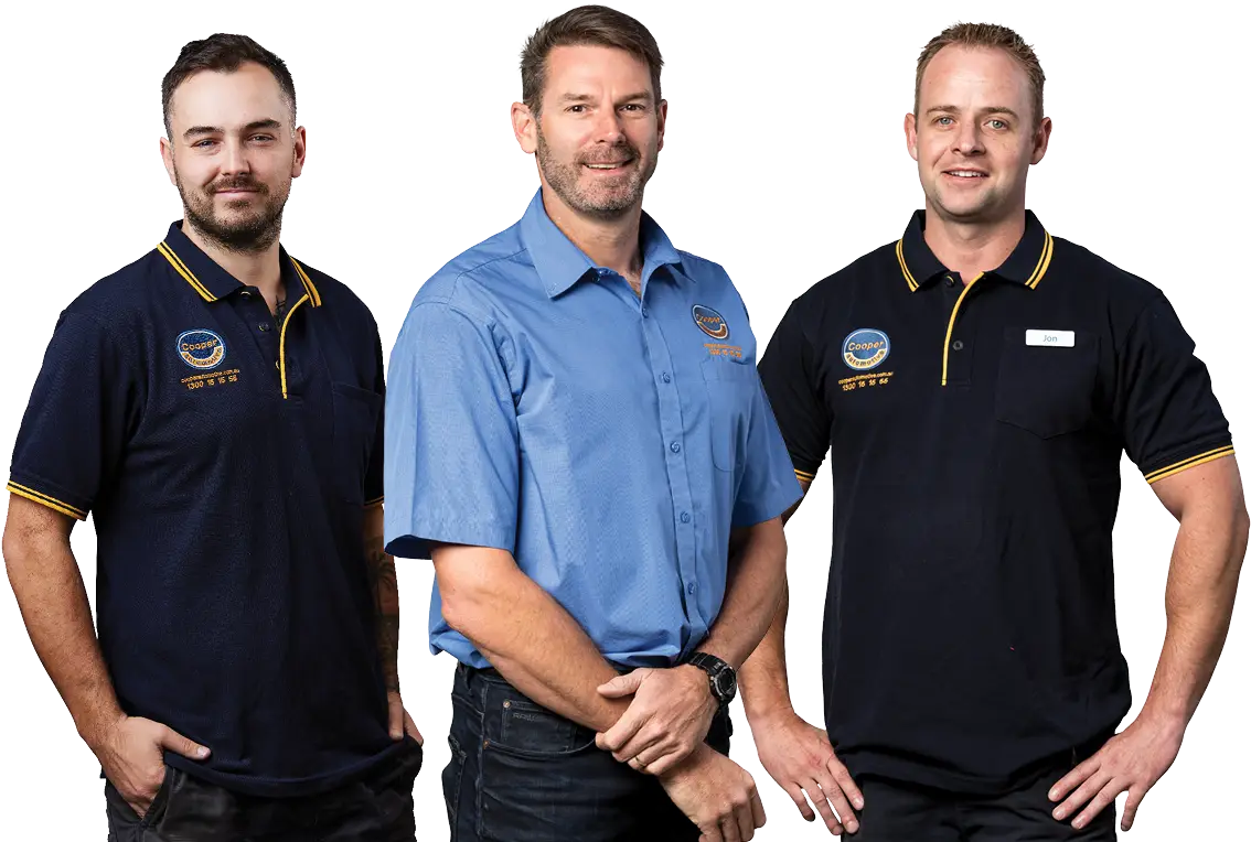 3 male mechanics facing camera and smiling